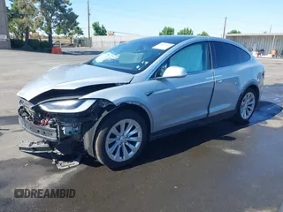 2016 Tesla Model X 70D with VIN 5YJXCAE21GF033123, listed as a IAAI auction lot 39813497 with 162,509 mi miles and . Bid and sale history available at DreamBid. Image 21.