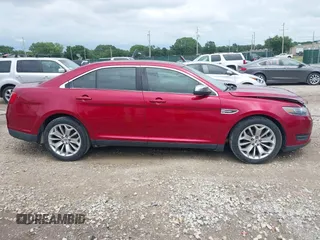 2015 Ford Taurus Limited with VIN 1FAHP2F80FG180450, listed as a IAAI auction lot 42499024 with 127,421 mi miles and . Bid and sale history available at DreamBid. Image 13.