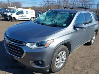 2021 Chevrolet Traverse LT Cloth with VIN 1GNEVGKW2MJ146411, listed as a IAAI auction lot 41694651 with 57,673 mi miles. Bid and sale history available at carsss.com. Image 20.