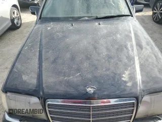 1994 Mercedes-Benz E Class with VIN WDBEA66EXRC086128, listed as a Copart auction lot 74996054 with 0 mi miles and Salvage Title. Bid and sale history available at carsss.com. Image 11.