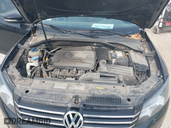 2015 Volkswagen Passat Limited Edition Edition z VIN 1VWAT7A37FC004161, wystawiony jako IAAI lot #42497971 z przebiegiem 176 812 mil mil oraz . Historia ofert i sprzedaży dostępna na DreamBid. Obrazek 10.