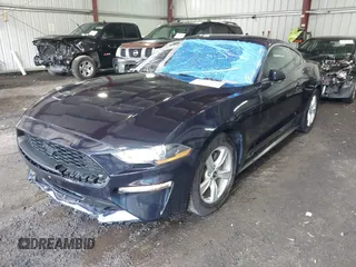 2021 Ford Mustang EcoBoost z VIN 1FA6P8TH4M5126706, wystawiony jako IAAI lot #42465164 z przebiegiem 49 795 mil mil oraz . Historia ofert i sprzedaży dostępna na DreamBid. Obrazek 17.