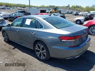 2021 Volkswagen Passat SE with VIN 1VWSA7A39MC011507, listed as a IAAI auction lot 42160879 with 82,639 mi miles and . Bid and sale history available at DreamBid. Image 3.