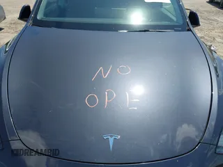 2024 Tesla Model Y with VIN 7SAYGDED3RF019063, listed as a IAAI auction lot 42061888 with 13,763 mi miles and . Bid and sale history available at DreamBid. Image 10.