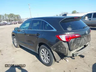 2016 Acura RDX with VIN 5J8TB4H36GL011656, listed as a IAAI auction lot 41421569 with 128,005 mi miles. Bid and sale history available at carsss.com. Image 3.