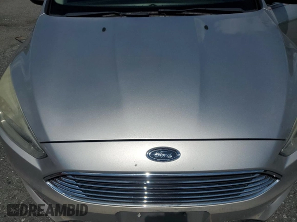 2015 Ford Focus Titanium with VIN 1FADP3J27FL267339, listed as a Copart auction lot 63395835 with 73,372 mi miles and Salvage title. Bid and sale history available at DreamBid. Image 11.
