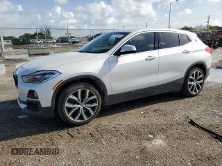 2018 BMW X2 xDrive28i with VIN WBXYJ5C38JEF74486, listed as a Copart auction lot 70311644 with 45,730 mi miles and Salvage Title. Bid and sale history available at carsss.com. Image 1.