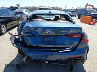 2021 BMW 4 Series 430i z VIN WBA53AP08MCG09446, wystawiony jako IAAI lot #41664926 z przebiegiem 18 544 mil mil oraz . Historia ofert i sprzedaży dostępna na DreamBid. Obrazek 16.