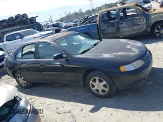 1999 Nissan Altima XE with VIN 1N4DL01D2XC124747, listed as a IAAI auction lot 41750853 with 110,221 mi miles. Bid and sale history available at carsss.com. Image 14.
