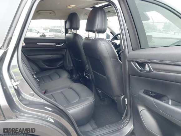 2022 Mazda CX-5 2.5 S Carbon Edition with VIN JM3KFBCM3N0594597, listed as a IAAI auction lot 40799182 with NaN miles. Bid and sale history available at carsss.com. Image 8.