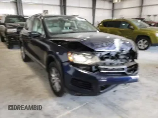 2012 Volkswagen Touareg Sport с VIN WVGEK9BP6CD009633, выставлен на аукционе Copart как лот 85475414 с пробегом 139 872 миль миль и Списание • Salvage title. История ставок и продаж доступна на DreamBid. Изображение 11.