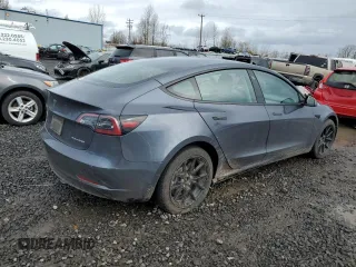 2023 Tesla Model 3 Long Range with VIN 5YJ3E1EB6PF686927, listed as a Copart auction lot 45602285 with 46,534 mi miles and Salvage Title. Bid and sale history available at DreamBid. Image 3.