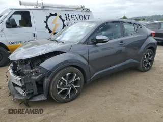 2018 Toyota C-HR XLE with VIN NMTKHMBX0JR042667, listed as a Copart auction lot 54173255 with 50,395 mi miles and Salvage Title. Bid and sale history available at carsss.com. Image 1.