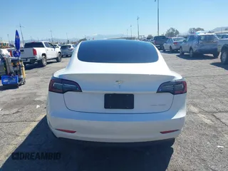 2022 Tesla Model 3 Long Range with VIN 5YJ3E1EB7NF298456, listed as a IAAI auction lot 41859304 with Not Provided miles and . Bid and sale history available at DreamBid. Image 16.