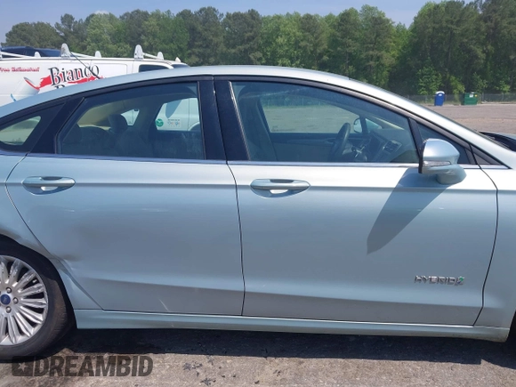 2014 Ford Fusion SE Hybrid with VIN 3FA6P0LU8ER251057, listed as a IAAI auction lot 42150589 with 188,192 mi miles and . Bid and sale history available at DreamBid. Image 13.