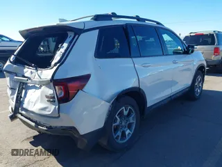 2023 Honda Passport TrailSport with VIN 5FNYF8H60PB015912, listed as a IAAI auction lot 41667749 with 35,019 mi miles and . Bid and sale history available at carsss.com. Image 4.