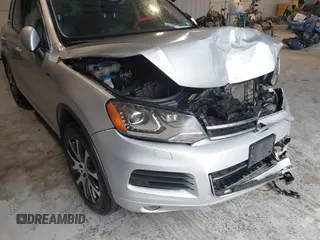 2011 Volkswagen Touareg Exec with VIN WVGFK9BP4BD005986, listed as a IAAI auction lot 41183877 with 109,005 mi miles and . Bid and sale history available at DreamBid. Image 6.