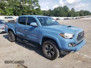 2019 Toyota Tacoma SR5 with VIN 3TMAZ5CN5KM104594, listed as a Copart auction lot 62704195 with 96,569 mi miles and Clean title. Bid and sale history available at DreamBid. Image 4.