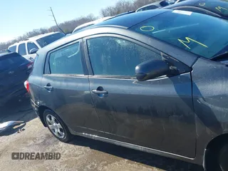 2009 Toyota Matrix with VIN 2T1KU40EX9C084721, listed as a IAAI auction lot 41748177 with 148,374 mi miles. Bid and sale history available at carsss.com. Image 13.