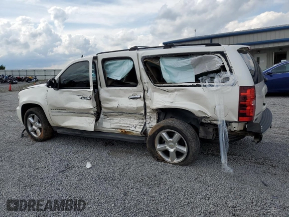 2012 Chevrolet Suburban LTZ with VIN 1GNSKKE7XCR288587, listed as a Copart auction lot 58721725 with 234,900 mi miles and Salvage title. Bid and sale history available at DreamBid. Image 2.