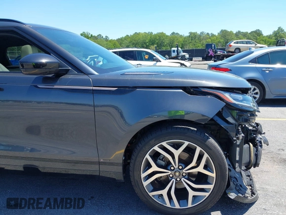 2020 Land Rover Range Rover Velar R-Dynamic S z VIN SALYK2EX5LA243809, wystawiony jako IAAI lot #42200383 z przebiegiem 66 381 mil mil oraz . Historia ofert i sprzedaży dostępna na DreamBid. Obrazek 18.