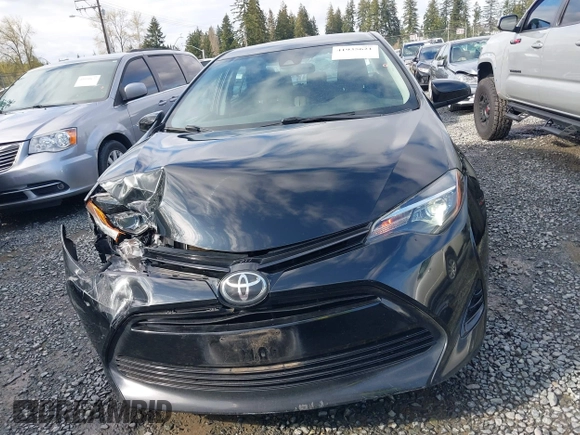 2018 Toyota Corolla L z VIN 2T1BURHEXJC098138, wystawiony jako IAAI lot #41935621 z przebiegiem 103 937 mil mil oraz . Historia ofert i sprzedaży dostępna na DreamBid. Obrazek 12.