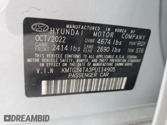 2023 Genesis G70 2.0T with VIN KMTG34TA3PU114905, listed as a Copart auction lot 61777435 with 26,493 mi miles and Salvage title. Bid and sale history available at DreamBid. Image 13.