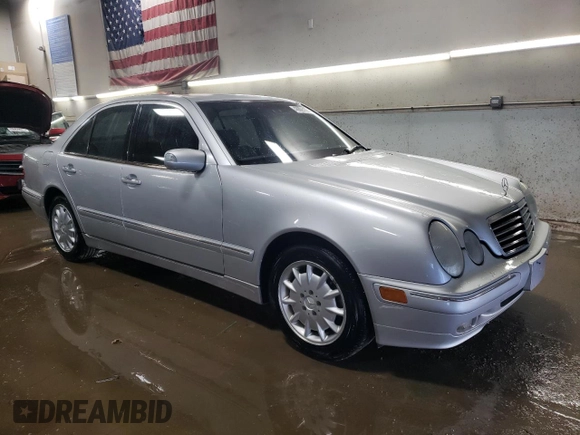 2001 Mercedes-Benz E-Class with VIN WDBJF65J11B357053, listed as a Copart auction lot 48805155 with 188,038 mi miles and Salvage Title. Bid and sale history available at carsss.com. Image 4.