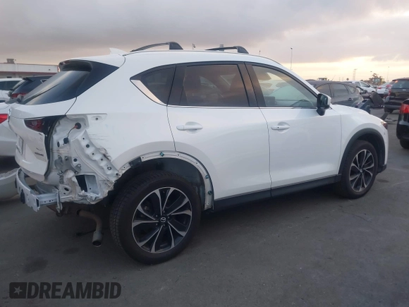 2022 Mazda CX-5 S Premium Plus with VIN JM3KFBEM6N0615083, listed as a IAAI auction lot 41907406 with 49,617 mi miles and . Bid and sale history available at carsss.com. Image 14.