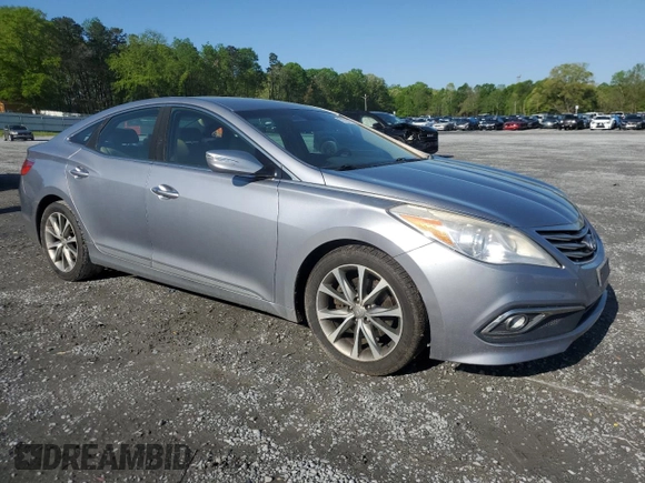 2015 Hyundai Azera z VIN KMHFG4JGXFA483472, wystawiony jako Copart lot #52216745 z przebiegiem 130 758 mil mil oraz Szkoda całkowita • Salvage title. Historia ofert i sprzedaży dostępna na DreamBid. Obrazek 4.