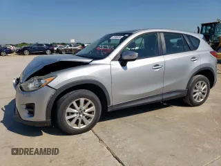 2016 Mazda CX-5 Sport with VIN JM3KE2BY6G0671358, listed as a Copart auction lot 51990095 with 117,763 mi miles and Salvage Title. Bid and sale history available at carsss.com. Image 1.