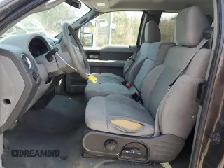 2007 Ford F-150 XLT with VIN 1FTPX14597NA52942, listed as a Copart auction lot 52980215 with 149,889 mi miles and Salvage Title. Bid and sale history available at carsss.com. Image 7.