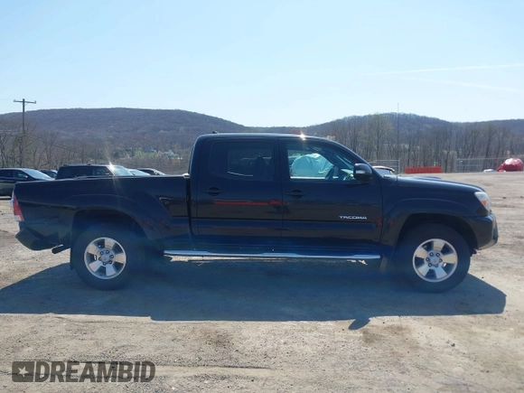 2015 Toyota Tacoma with VIN 3TMMU4FN7FM085666, listed as a IAAI auction lot 42051241 with 224,513 mi miles and . Bid and sale history available at DreamBid. Image 13.
