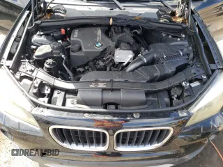 2014 BMW X1 xDrive28i z VIN WBAVL1C5XEVY16263, wystawiony jako Copart lot #52242225 z przebiegiem 154 951 mil mil oraz Szkoda całkowita • Salvage title. Historia ofert i sprzedaży dostępna na DreamBid. Obrazek 12.