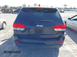 2014 Jeep Grand Cherokee Laredo with VIN 1C4RJEAG7EC263590, listed as a IAAI auction lot 41699106 with 136,581 mi miles and . Bid and sale history available at DreamBid. Image 17.