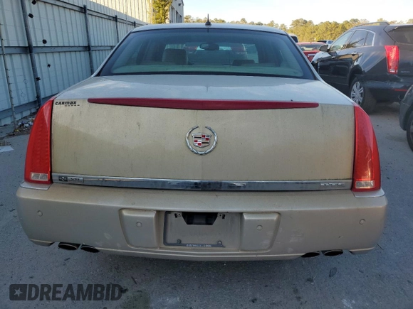 2007 Cadillac DTS V8 z VIN 1G6KD57Y77U125427, wystawiony jako Copart lot #82278094 z przebiegiem 117 812 mil mil oraz Czysty tytuł • Clean title. Historia ofert i sprzedaży dostępna na DreamBid. Obrazek 6.