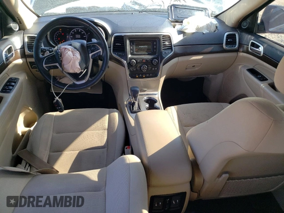2017 Jeep Grand Cherokee Laredo with VIN 1C4RJEAG4HC952605, listed as a Copart auction lot 56693145 with 115,035 mi miles and Salvage title. Bid and sale history available at DreamBid. Image 8.