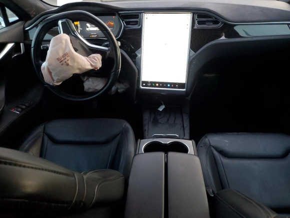 2016 Tesla Model S 70 kWh Battery with VIN 5YJSA1E19GF151945, listed as a Copart auction lot 83851454 with 74,473 mi miles and Non Repairable. Bid and sale history available at carsss.com. Image 8.