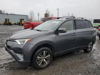 2018 Toyota RAV4 XLE with VIN JTMRFREV0JJ200337, listed as a Copart auction lot 84901594 with 57,301 mi miles and Salvage Title. Bid and sale history available at carsss.com. Image 1.