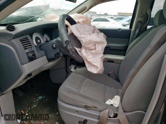 2007 Dodge Durango SLT z VIN 1D8HD48P87F581689, wystawiony jako Copart lot #54937005 z przebiegiem Nie podano mil oraz Szkoda całkowita • Salvage title. Historia ofert i sprzedaży dostępna na DreamBid. Obrazek 7.