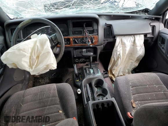 1996 Jeep Grand Cherokee Laredo with VIN 1J4GZ58S3TC297818, listed as a Copart auction lot 67712584 with 284,653 mi miles and Salvage Title. Bid and sale history available at carsss.com. Image 8.