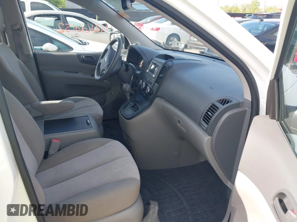 2014 Kia Sedona LX with VIN KNDMG4C75E6545483, listed as a IAAI auction lot 42166152 with 121,827 mi miles and . Bid and sale history available at carsss.com. Image 5.