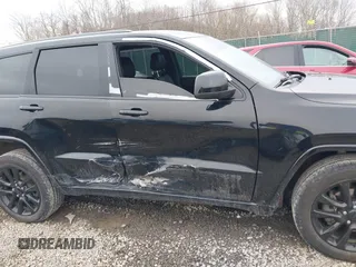 2017 Jeep Grand Cherokee Laredo with VIN 1C4RJFAG9HC882251, listed as a IAAI auction lot 41696710 with 129,627 mi miles and . Bid and sale history available at DreamBid. Image 6.