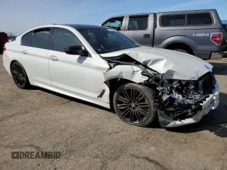 2018 BMW 5 Series M550i xDrive with VIN WBAJB9C54JB287422, listed as a Copart auction lot 46017034 with Not provided miles and Salvage title. Bid and sale history available at DreamBid. Image 4.