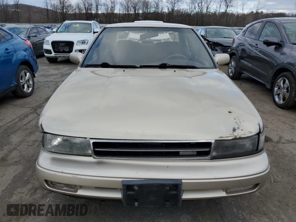 1990 Nissan Maxima with VIN JN1HJ01P8LT402950, listed as a Copart auction lot 82714734 with 60,727 mi miles and Clean title. Bid and sale history available at DreamBid. Image 5.