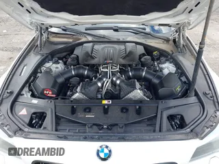 2013 BMW M5 with VIN WBSFV9C56DC772961, listed as a IAAI auction lot 41765457 with 104,568 mi miles. Bid and sale history available at carsss.com. Image 10.