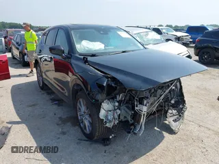 2020 Mazda CX-5 Grand Touring with VIN JM3KFADM1L0781634, listed as a IAAI auction lot 42333769 with 103,080 mi miles and . Bid and sale history available at DreamBid. Image 1.