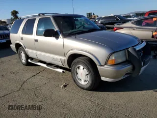 2000 GMC Jimmy SL with VIN 1GKCS13W9Y2341317, listed as a Copart auction lot 43249705 with 160,889 mi miles and Clean Title. Bid and sale history available at carsss.com. Image 4.