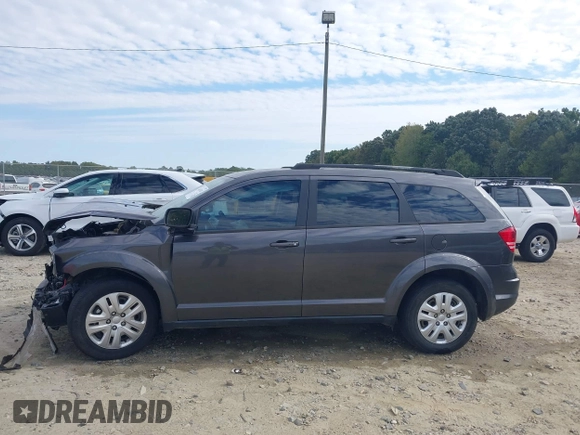 2019 Dodge Journey SE Value with VIN 3C4PDCAB1KT860354, listed as a IAAI auction lot 40605889 with 137,346 mi miles and . Bid and sale history available at DreamBid. Image 14.