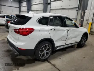 2017 BMW X1 xDrive28i with VIN WBXHT3Z38H4A53824, listed as a Copart auction lot 52500215 with 106,782 mi miles and Salvage title. Bid and sale history available at DreamBid. Image 3.